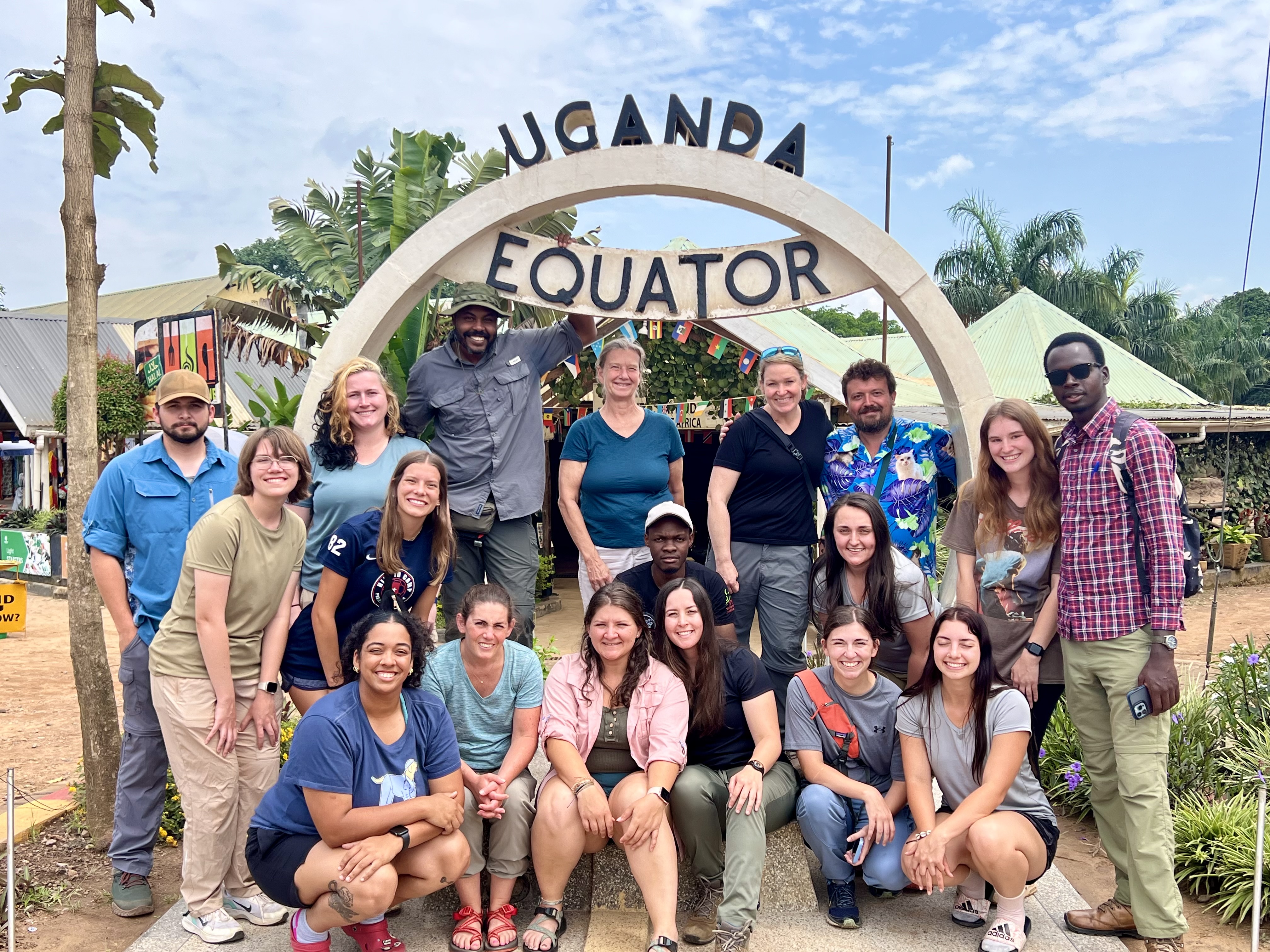 Students and faculty members pose together in Uganda